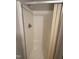 Enclosed shower with silver hardware and a cream-colored shower curtain provides clean comfort at 1942 Brier Ln, Graham, NC 27253