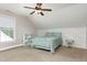 Charming bedroom with large window, dormered ceiling, and cozy decor at 20 Wood Ibis Way, Louisburg, NC 27549