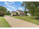 Charming one-story home with a inviting front porch, lush lawn, and long driveway at 20 Wood Ibis Way, Louisburg, NC 27549