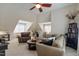 Spacious living room with high ceilings, comfortable seating, and a cozy atmosphere at 200 Cobblepoint Way, Holly Springs, NC 27540