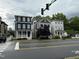Charming multi-story homes featuring classic architectural design and inviting front porches on a neighborhood street at 200 Walnut St, Cary, NC 27511