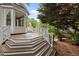 Picturesque backyard deck with decorative railing, offering a serene space for outdoor entertaining at 2001 Dobson Ct, Raleigh, NC 27612