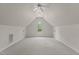 Spacious bonus room featuring vaulted ceiling, ample natural light, and potential for customization at 2001 Dobson Ct, Raleigh, NC 27612