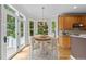 Breakfast nook with hardwood floors, lots of windows, and a view at 2001 Dobson Ct, Raleigh, NC 27612