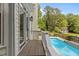 View from the porch with a view of the backyard pool, showcasing outdoor living at 2001 Dobson Ct, Raleigh, NC 27612