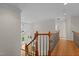 The foyer has hardwood floors, with views to the Gathering room, dining area, and pool at 2001 Dobson Ct, Raleigh, NC 27612