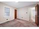 This bedroom features a window for natural light and a closet for storage at 2016 Tryon Rd, Raleigh, NC 27603