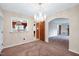 Bright dining room with chandelier, open to living room and kitchen at 2016 Tryon Rd, Raleigh, NC 27603