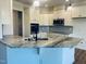 Modern kitchen featuring stainless steel appliances, granite counters, light backsplash, and white cabinetry at 204 Seahawk Way, Zebulon, NC 27597