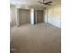 Massive bedroom featuring neutral carpet, several closets and ceiling fan at 21 Suncrest Ct, Durham, NC 27703
