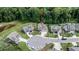 Neighborhood aerial view showcasing the home's location in a cul-de-sac with mature trees at 212 Hardwick St, Clayton, NC 27527