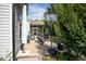 Backyard patio featuring a basketball hoop, grill, and screened-in porch at 212 Hardwick St, Clayton, NC 27527