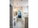 This bathroom features double sinks, a bathtub, a shower, tile flooring, and views of the Primary bedroom at 212 Hardwick St, Clayton, NC 27527