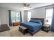 Comfortable bedroom with a queen-size bed, soft carpet, and natural light at 212 Hardwick St, Clayton, NC 27527