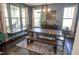Dining room featuring a wooden table, bench seating, and natural light at 212 Hardwick St, Clayton, NC 27527