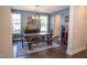 Stylish dining room featuring rustic wooden furniture and an area rug at 212 Hardwick St, Clayton, NC 27527