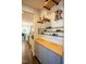 Hallway features built in wine storage and serving area adjacent to the kitchen at 212 Hardwick St, Clayton, NC 27527
