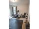 Bright home gym featuring exercise equipment, mats, and a large window at 212 Hardwick St, Clayton, NC 27527