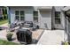 Backyard patio featuring comfortable seating and a grill at 212 Hardwick St, Clayton, NC 27527