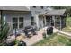 Aerial view of backyard patio with seating and a grill at 212 Hardwick St, Clayton, NC 27527