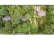 Aerial view of property showcasing mature trees and neighboring homes at 220 Dalton Dr, Raleigh, NC 27615