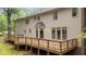 Expansive backyard featuring a spacious deck perfect for outdoor gatherings at 220 Dalton Dr, Raleigh, NC 27615