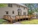 Expansive backyard featuring a spacious deck perfect for outdoor gatherings at 220 Dalton Dr, Raleigh, NC 27615