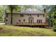 Expansive backyard featuring a spacious deck perfect for outdoor gatherings at 220 Dalton Dr, Raleigh, NC 27615