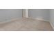 Bright bedroom features neutral carpeting, blue walls, and white trim work at 220 Dalton Dr, Raleigh, NC 27615