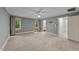 Large bedroom with ensuite bathroom access, carpet, and neutral paint at 220 Dalton Dr, Raleigh, NC 27615