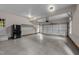 Spacious two-car garage with epoxy floors, EV charger, and ample storage at 220 Dalton Dr, Raleigh, NC 27615