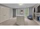 Bright walk-in closet with lots of storage and natural light from two large windows at 220 Dalton Dr, Raleigh, NC 27615