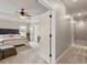 Bright main bedroom featuring a door to the hallway and comfortable seating at 2207 Cameron Pond Dr, Cary, NC 27519