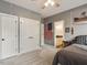 Bedroom with a bed and closet space, offering a comfortable and functional living area at 2207 Cameron Pond Dr, Cary, NC 27519