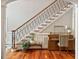 Elegant foyer showing the beautiful staircase, hardwood floors, and grand ambiance at 2207 Cameron Pond Dr, Cary, NC 27519