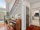 Grand foyer with a staircase and piano at 2207 Cameron Pond Dr, Cary, NC 27519