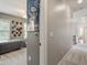 View of the hallway showcasing access to a bedroom and the staircase at 2207 Cameron Pond Dr, Cary, NC 27519