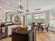 Gourmet kitchen featuring an island and bright breakfast area at 2207 Cameron Pond Dr, Cary, NC 27519