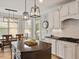 Gourmet kitchen featuring an island and bright breakfast area at 2207 Cameron Pond Dr, Cary, NC 27519