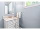 Bathroom features a modern sink and white vanity with neutral paint at 228 Birch Creek Dr, Fuquay Varina, NC 27526