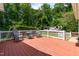 Deck with seating and a view of the backyard and parked camper at 228 Birch Creek Dr, Fuquay Varina, NC 27526
