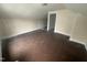 Spacious attic area with hardwood floors, built in cabinets and neutral paint at 2503 Chapel Hill Rd, Durham, NC 27707