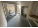 Basement area shows laundry hook-ups and potential for storage or living space at 2503 Chapel Hill Rd, Durham, NC 27707