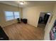 A room with hardwood floors and a window at 2505 Chapel Hill Rd, Durham, NC 27707