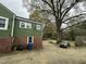 The rear of the house has plenty of room for parking at 2505 Chapel Hill Rd, Durham, NC 27707