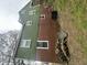 The back of the house features a brick foundation at 2505 Chapel Hill Rd, Durham, NC 27707