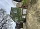 The side of the home features a garage and extra windows at 2505 Chapel Hill Rd, Durham, NC 27707