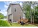 Back of home featuring a wooden deck and a small yard with privacy fence at 2801B Cannada Ave, Durham, NC 27704