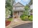 Charming two-story home featuring a welcoming front porch and well-maintained landscaping at 2801B Cannada Ave, Durham, NC 27704