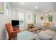 Bright living room featuring hardwood floors and large windows at 2801B Cannada Ave, Durham, NC 27704